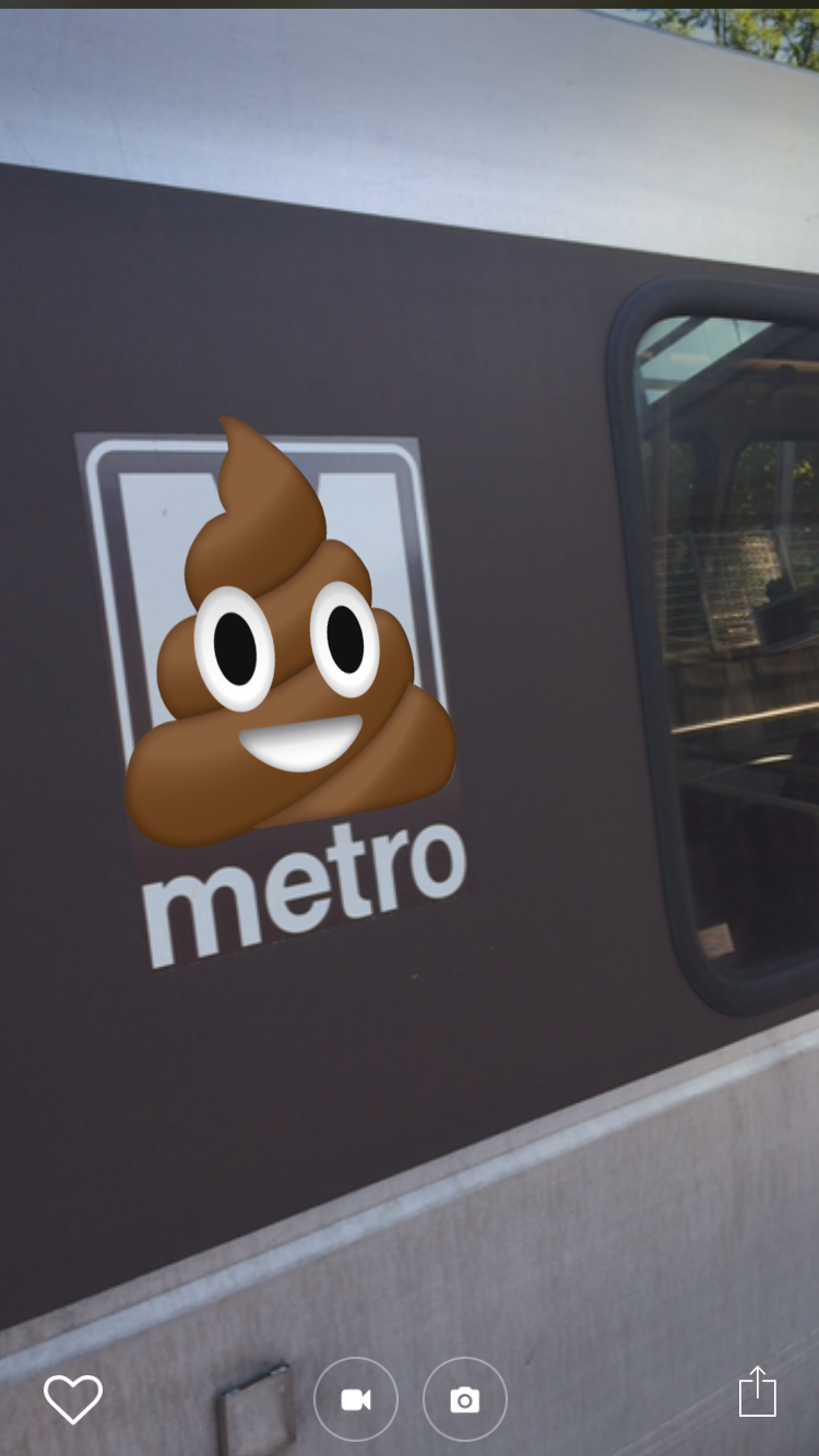 Augmented reality that turns Metro's logo into the poop emoji.